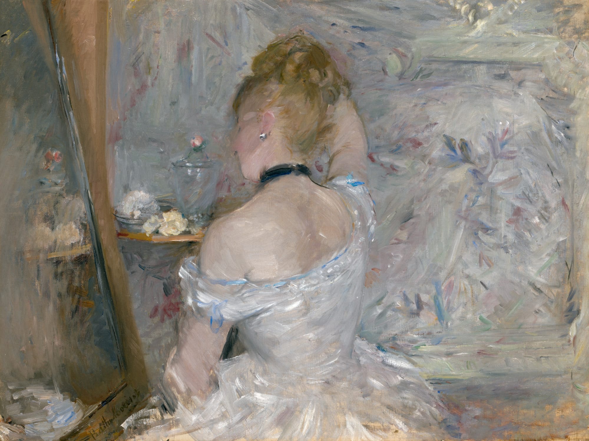 A woman in a white dress looks into a mirror. Her face and the mirror's reflection are obscured.