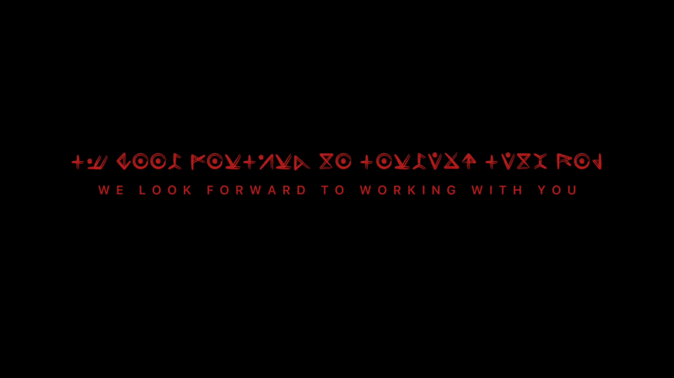 A part of Mr. Rainer's Solve-It Service's promo which shows alien text and the words "we look forward to working with you."